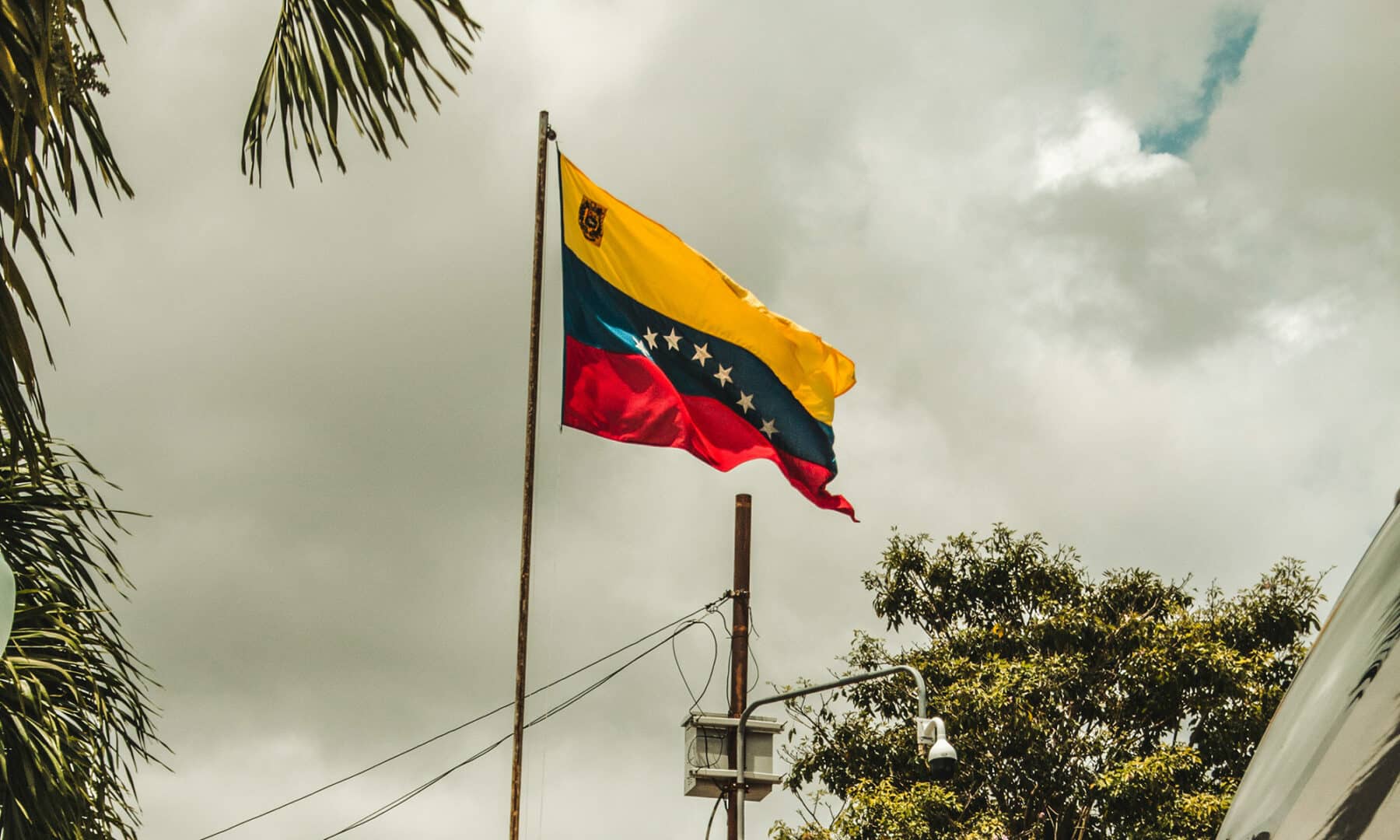 The Venezuelan flag flies above a home in Barquisimeto, Lara, Venezuela